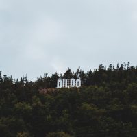 Dildo white letter sign in the mountains