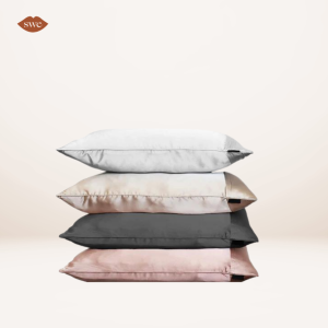 DiscoverNight Trisilk Pillow Cases on pale background with SWE lips logo in upper right corner