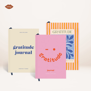 Papier Gratitude Journals on pale background with SWE lips logo in upper right corner