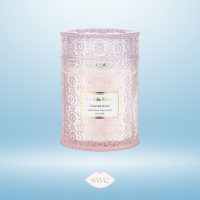 La Jolie Muse Candle from Amazon prime on gradient light blue background with SWE lips logo in bottom center