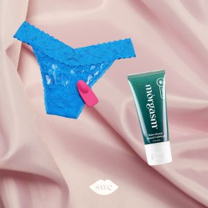ohmibod blue motion nex|1 panty vibe and morgasm cbd arousal gel on pink silk sheet background with white SWE lips logo