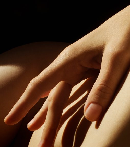 hand touching the body closeup